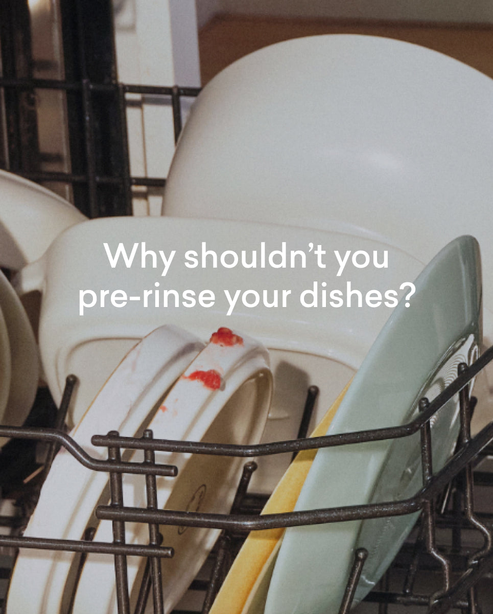 Dishwasher rack with dirty dishes and text questioning why pre-rinsing is unnecessary.